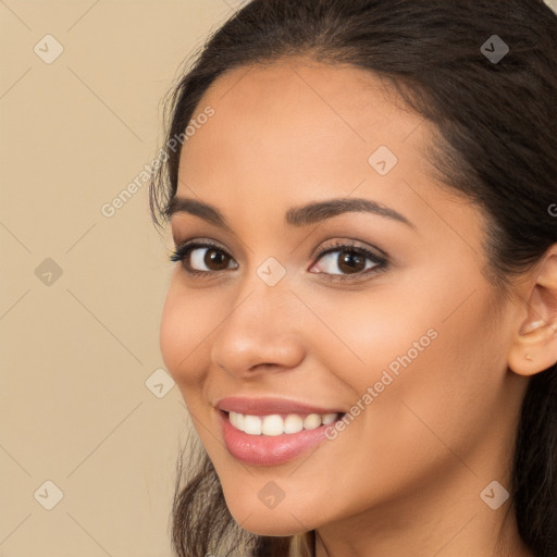 Joyful white young-adult female with long  brown hair and brown eyes