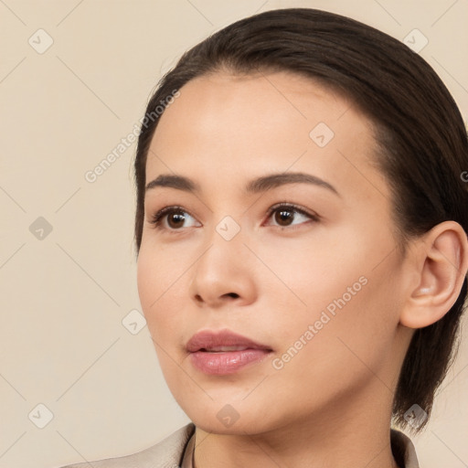 Neutral white young-adult female with long  brown hair and brown eyes