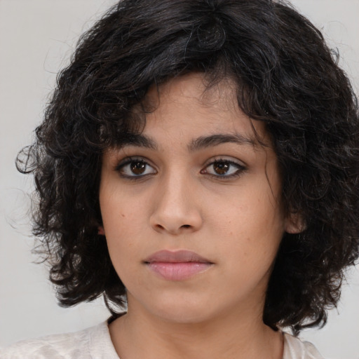 Neutral white young-adult female with medium  black hair and brown eyes