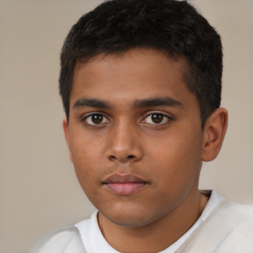 Neutral latino child male with short  brown hair and brown eyes