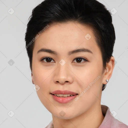 Joyful asian young-adult female with short  brown hair and brown eyes