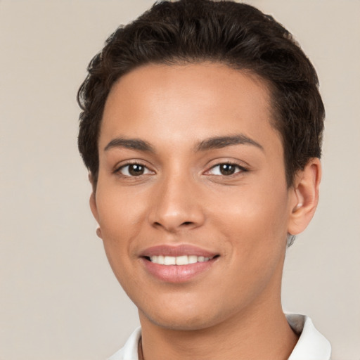 Joyful white young-adult female with short  brown hair and brown eyes