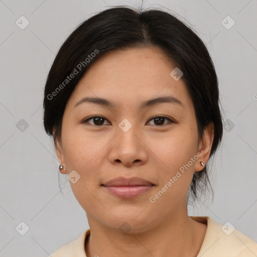 Joyful asian young-adult female with medium  brown hair and brown eyes