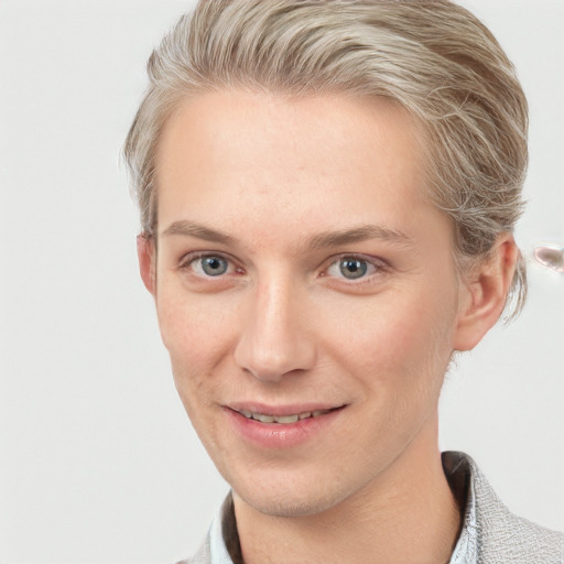 Joyful white adult female with short  brown hair and grey eyes