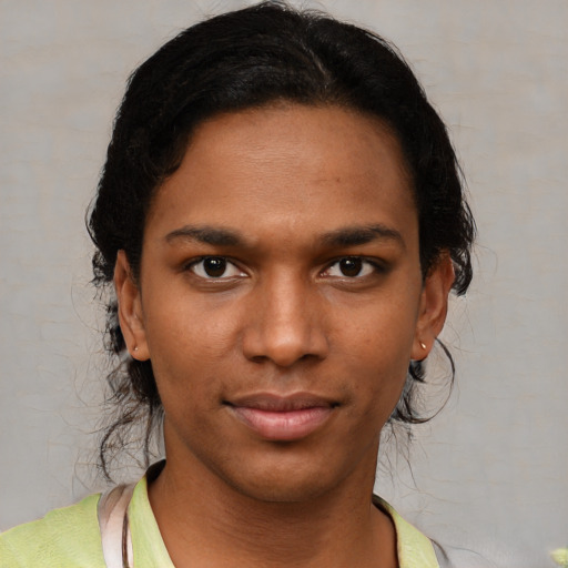 Neutral black young-adult female with short  brown hair and brown eyes
