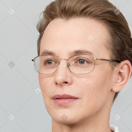 Joyful white adult female with short  brown hair and grey eyes