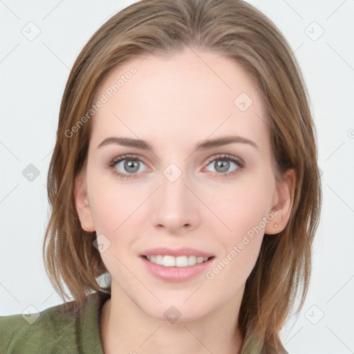 Joyful white young-adult female with long  brown hair and blue eyes