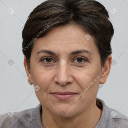 Joyful white adult female with short  brown hair and brown eyes