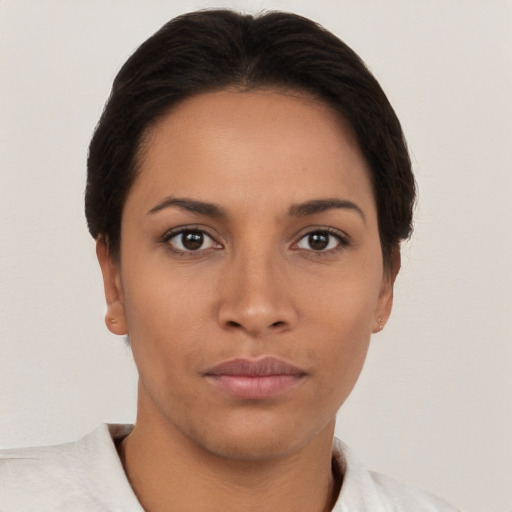 Neutral white young-adult female with short  brown hair and brown eyes