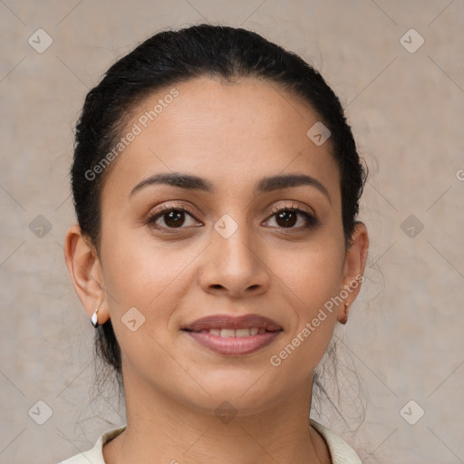 Joyful latino young-adult female with short  brown hair and brown eyes