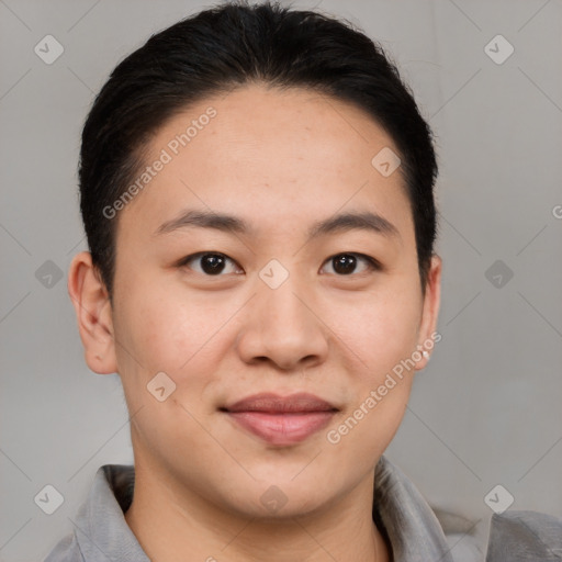 Joyful asian young-adult male with short  brown hair and brown eyes