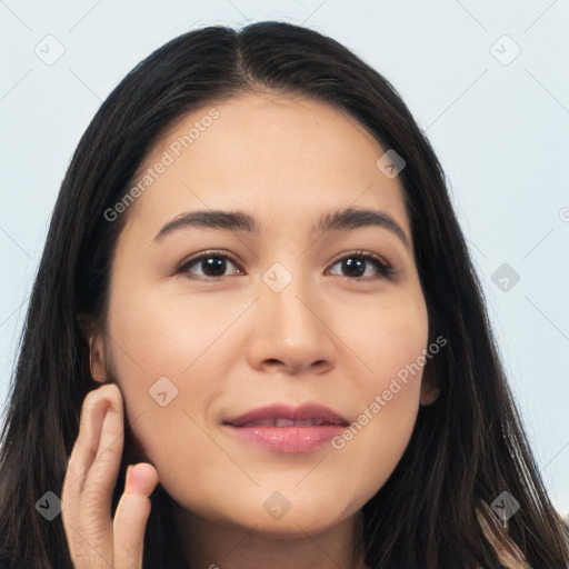 Joyful latino young-adult female with long  brown hair and brown eyes