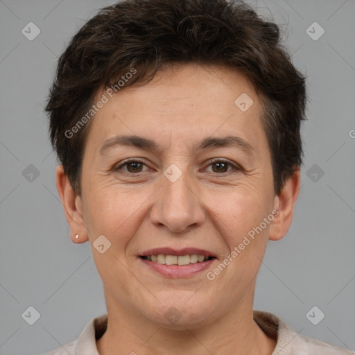 Joyful white adult female with short  brown hair and brown eyes