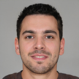 Neutral white young-adult male with short  brown hair and brown eyes