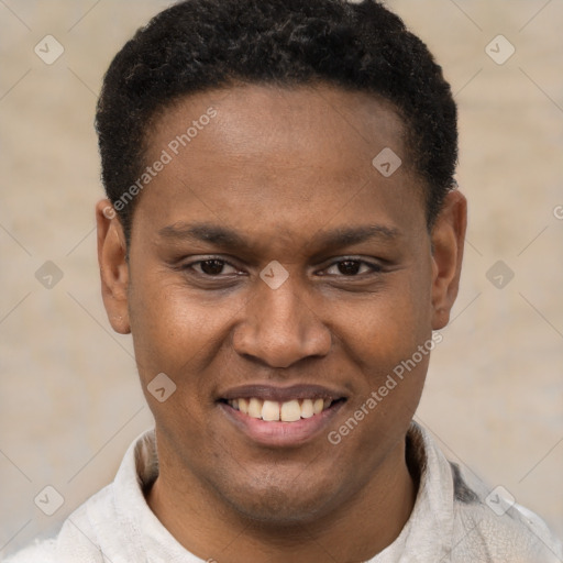 Joyful latino young-adult male with short  brown hair and brown eyes