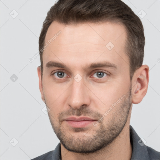 Neutral white young-adult male with short  brown hair and brown eyes