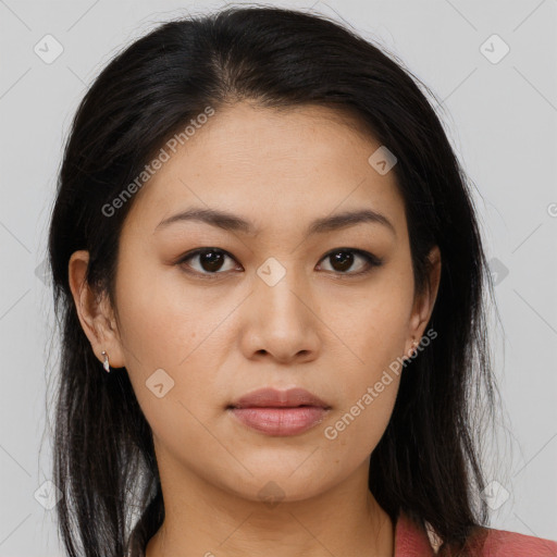 Joyful asian young-adult female with long  brown hair and brown eyes