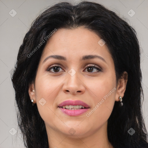 Joyful asian adult female with long  brown hair and brown eyes