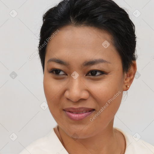 Joyful asian young-adult female with short  brown hair and brown eyes