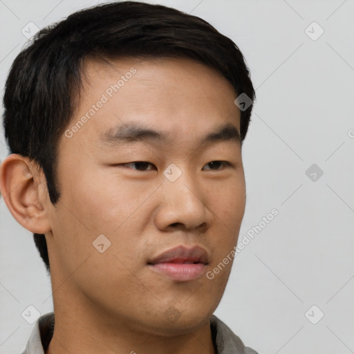 Neutral asian young-adult male with short  brown hair and brown eyes