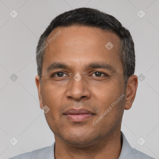 Neutral latino adult male with short  black hair and brown eyes