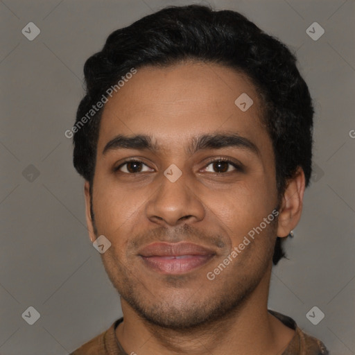 Joyful latino young-adult male with short  black hair and brown eyes