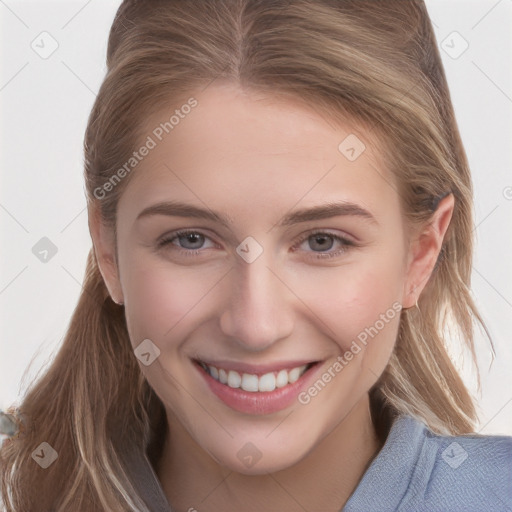 Joyful white young-adult female with long  brown hair and grey eyes