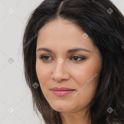 Joyful latino young-adult female with long  brown hair and brown eyes