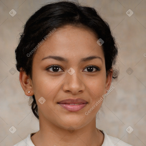 Joyful latino young-adult female with short  brown hair and brown eyes