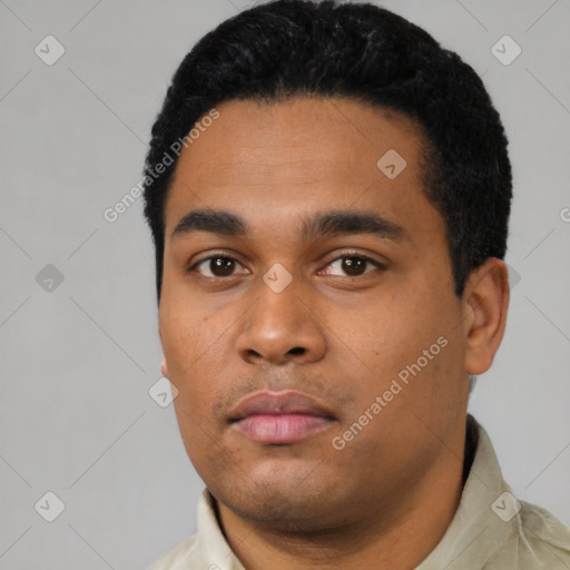 Neutral latino young-adult male with short  black hair and brown eyes