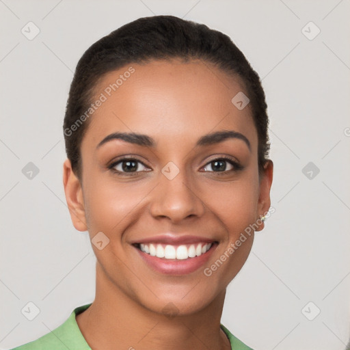 Joyful latino young-adult female with short  brown hair and brown eyes