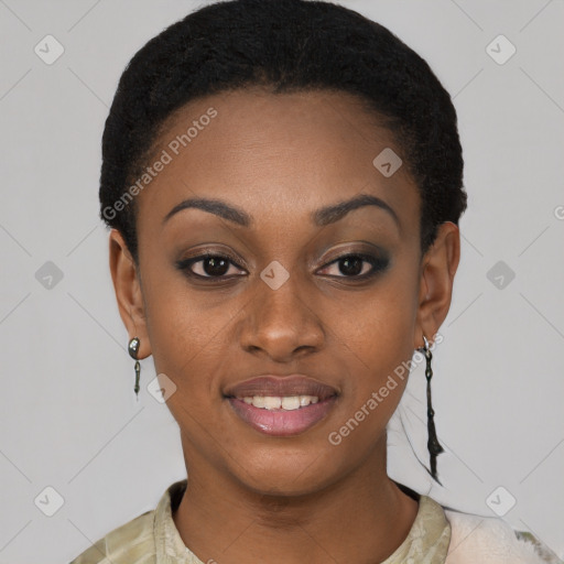 Joyful black young-adult female with short  black hair and brown eyes