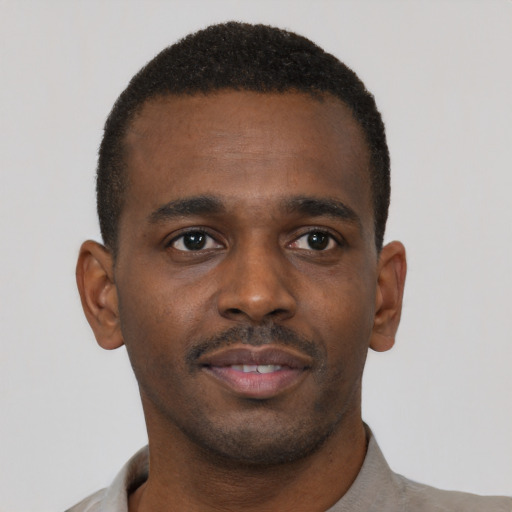 Neutral black young-adult male with short  brown hair and brown eyes
