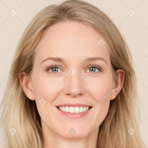 Joyful white young-adult female with long  brown hair and blue eyes