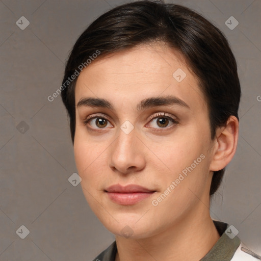 Joyful white young-adult female with medium  brown hair and brown eyes