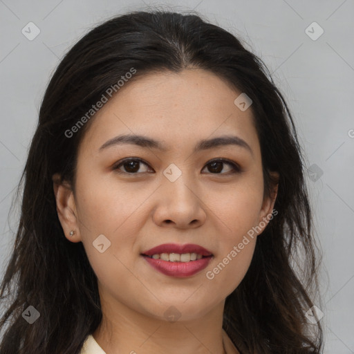 Joyful asian young-adult female with long  brown hair and brown eyes