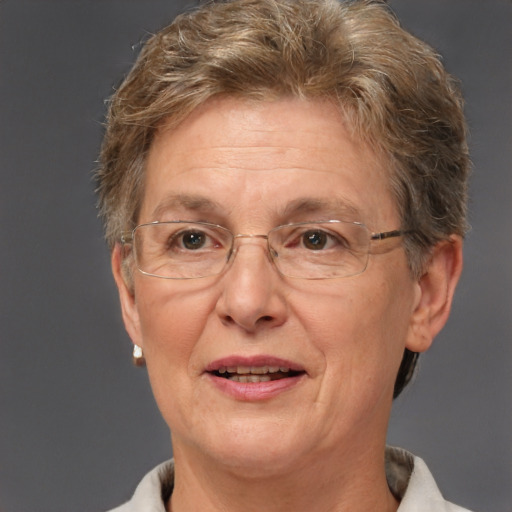 Joyful white middle-aged female with short  brown hair and brown eyes