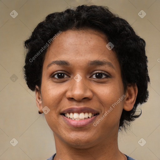 Joyful latino young-adult female with short  black hair and brown eyes