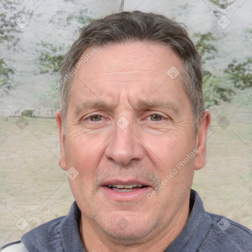 Joyful white middle-aged male with short  brown hair and brown eyes