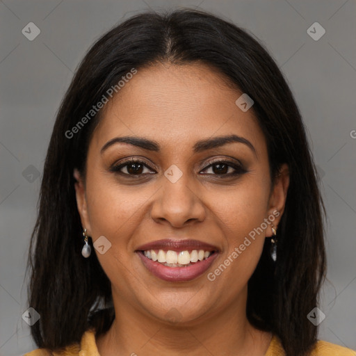 Joyful latino young-adult female with medium  brown hair and brown eyes