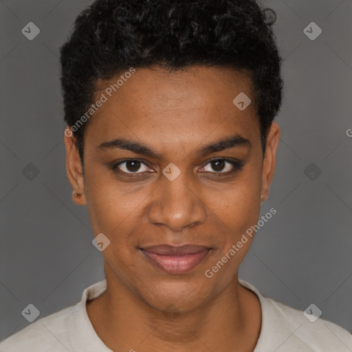 Joyful black young-adult female with short  brown hair and brown eyes