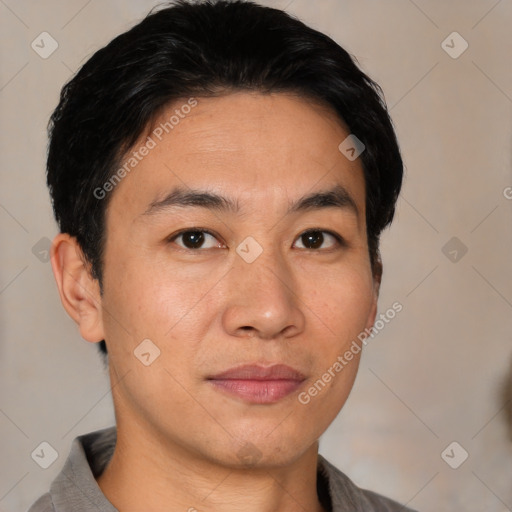 Joyful white young-adult male with short  black hair and brown eyes