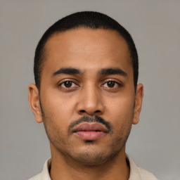 Neutral latino young-adult male with short  black hair and brown eyes