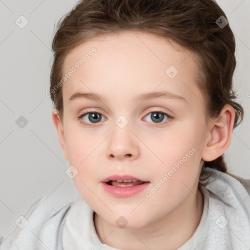 Joyful white child female with short  brown hair and brown eyes