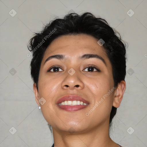 Joyful latino young-adult female with short  brown hair and brown eyes