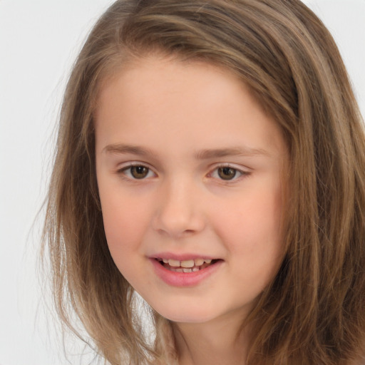 Joyful white child female with long  brown hair and brown eyes