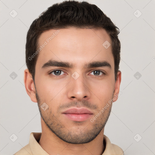 Neutral white young-adult male with short  brown hair and brown eyes