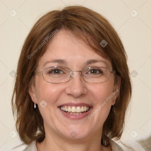 Joyful white adult female with medium  brown hair and blue eyes