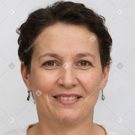 Joyful white adult female with short  brown hair and grey eyes