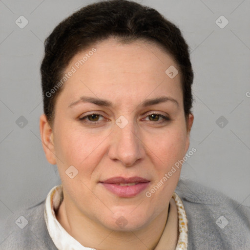 Joyful white adult female with short  brown hair and brown eyes